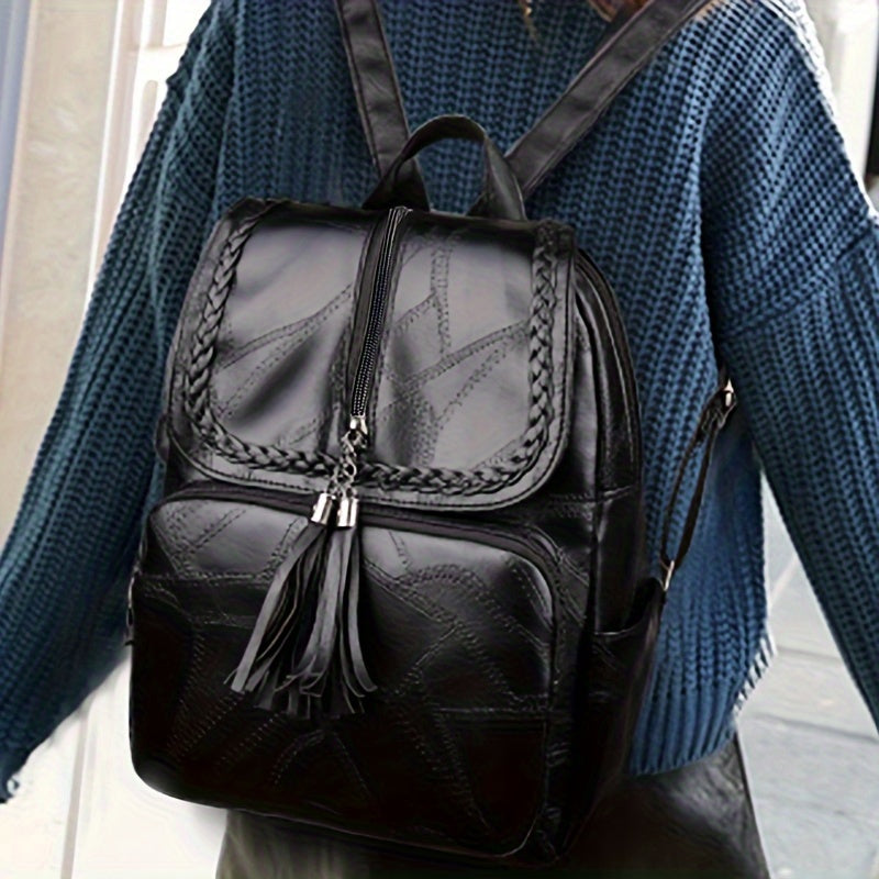 Luica - Stylish Black Backpack with Braided Flap and Tassel Detail